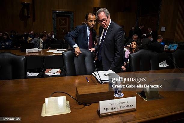 Trade Representative Michael Froman speaks to his assistant before the Senate Finance Committee hearing on Congress and U.S. Tariff Policy in the...