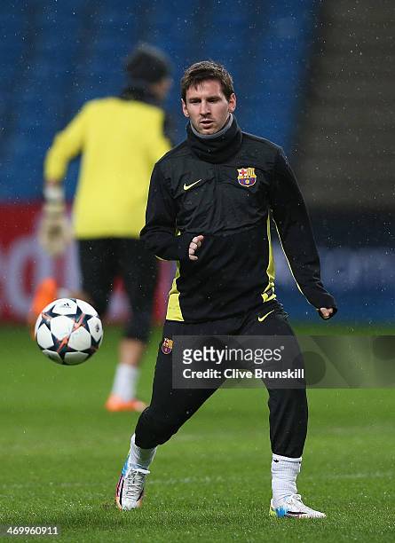 Lionel Messi of Barcelona in action during a training session ahead of their UEFA Champions League Round of 16 match 1st leg against Manchester City...