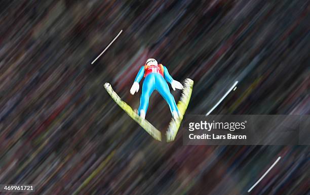 Maciej Kot of Poland jumps during the Men's Team Ski Jumping first round on day 10 of the Sochi 2014 Winter Olympics at the RusSki Gorki Ski Jumping...
