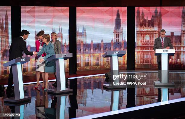 Labour leader Ed Miliband , shakes hands with SNP leader Nicola Sturgeon whilst Plaid Cymru leader Leanne Wood and Green Party Leader Natalie Bennett...