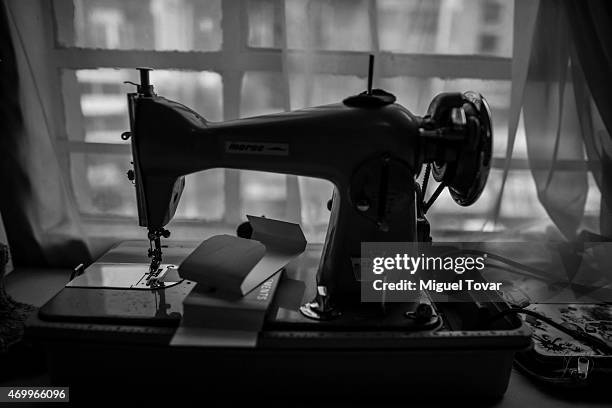 Sewing machine is seen at the studio of Mexican fashion designer Victor Hernal, known as Malafacha, who works on his new collection to participate in...