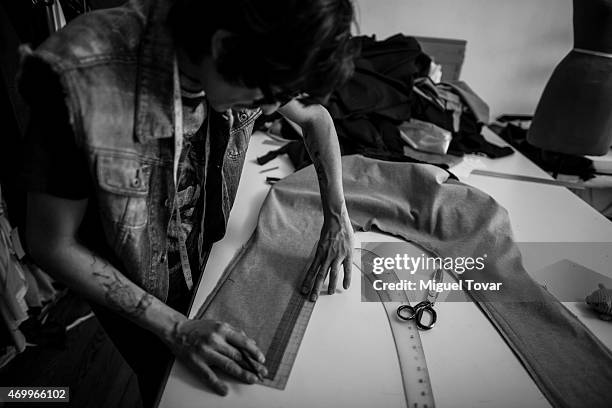 Mexican fashion designer Victor Hernal, known as Malafacha, works on his new collection to participate in Mercedes-Benz Fashion Week Mexico...