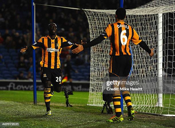 Yannick Sagbo of Hull City celebrates scoring their first goal with Curtis Davies of Hull City during the FA Cup fifth round match between Brighton &...