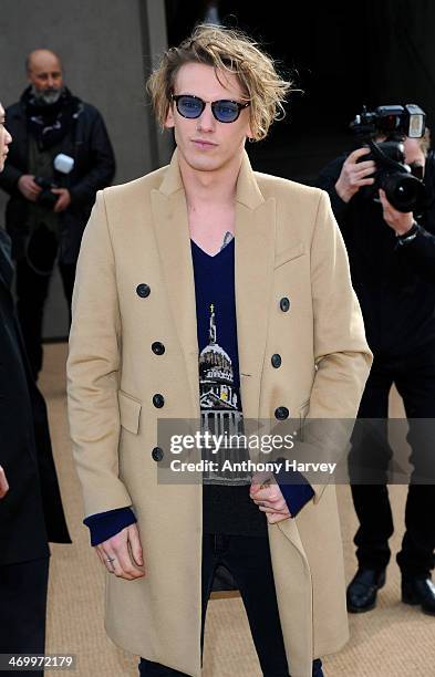 Jamie Campbell Bower attends the Burberry Prorsum show at London Fashion Week AW14 at Kensington Gardens on February 17, 2014 in London, England.