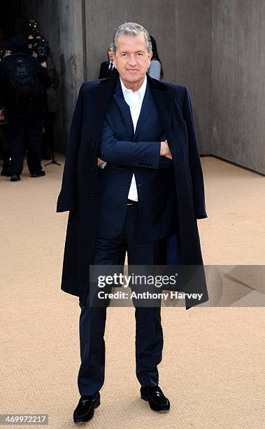 Mario Testino attends the Burberry Prorsum show at London Fashion Week AW14 at Kensington Gardens on February 17, 2014 in London, England.