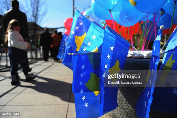 People attend a parade for the sixth anniversary of Kosovo's declaration of independence from Serbia on February 17, 2014 in Pristina, Kosovo. At the...