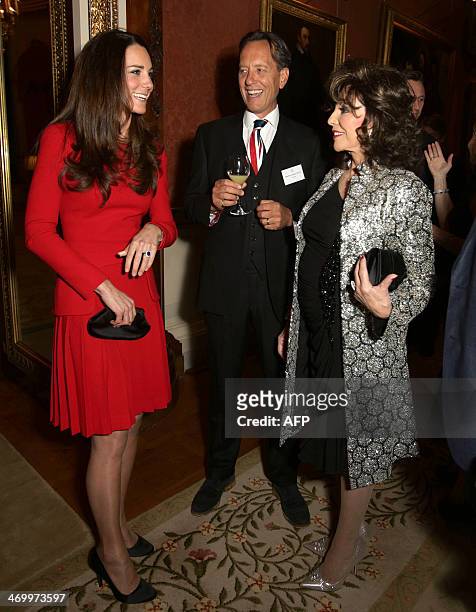 Britain's Catherine, Duchess of Cambridge meets British actress Joan Collins and Swaziland born actor Richard E. Grant during a Reception for the...