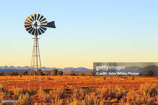 outback windmill. flinders ranges. australia. - flinders ranges stockfoto's en -beelden