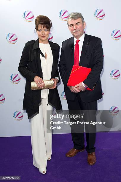 Gustl Mollath and Gabriele Pauli attend the 'Der Ruecktritt' photocall at Kino International on February 17, 2014 in Berlin, Germany.