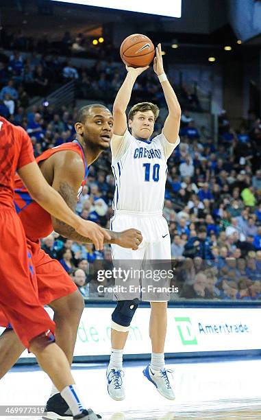 Grant Gibbs of the Creighton Bluejays shoots the ball during their game against the DePaul Blue Demons at CenturyLink Center on February 7, 2014 in...