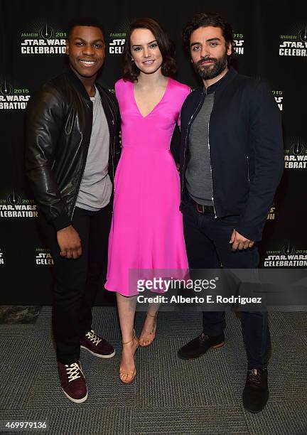 Actors John Boyega, Daisy Ridley and Oscar Isaac attend Star Wars Celebration 2015 on April 16, 2015 in Anaheim, California.