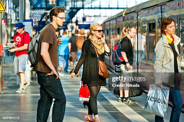 busy main train station (hauptbahnhof) in berlin, germany - prague train stock pictures, royalty-free photos & images