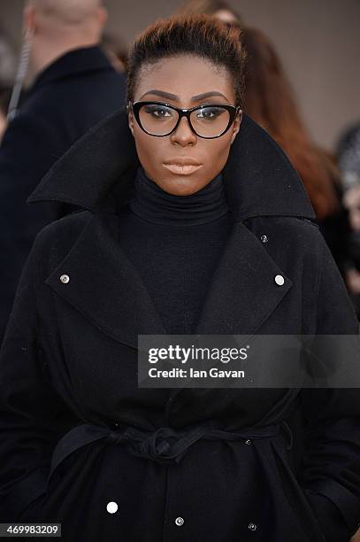 Laura Mvula arrives at Burberry Womenswear Autumn/Winter 2014 at Kensington Gardens on February 17, 2014 in London, England.