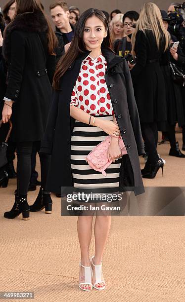 Angelababy arrives at Burberry Womenswear Autumn/Winter 2014 at Kensington Gardens on February 17, 2014 in London, England.