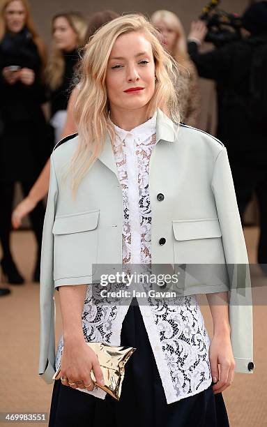 Kate Foley arrives at Burberry Womenswear Autumn/Winter 2014 at Kensington Gardens on February 17, 2014 in London, England.