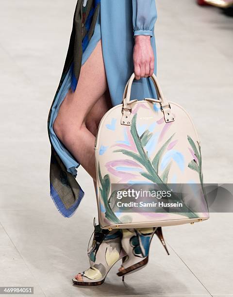 Model walks the runway at the Burberry Prorsum show at Perks Field during London Fashion Week AW14 in at the Kensington Gardens on February 17, 2014...