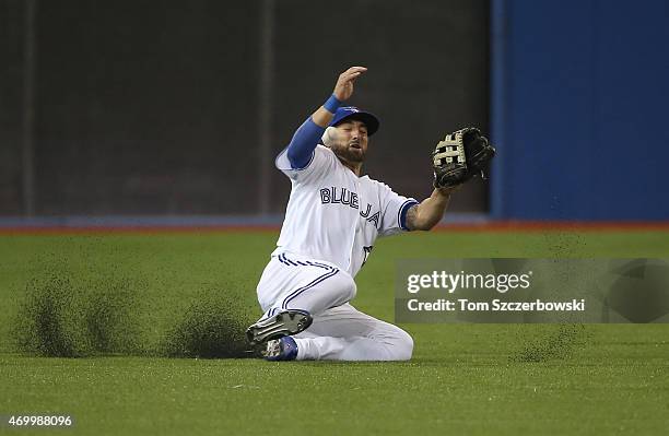 Kevin Pillar of the Toronto Blue Jays cannot make a sliding catch in the fifth inning as the ball gets past him leading to a run scoring on the play...