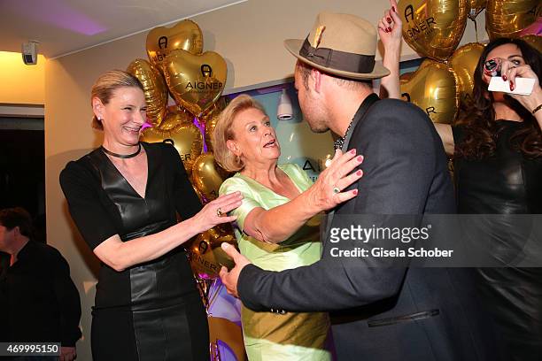 Sibylle Schoen, Evi Brandl and Marlon Roudette during the 50th Anniversary of AIGNER on April 16, 2015 in Munich, Germany.