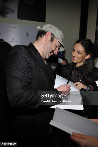 Alan Gelati and Alessandra Moschillo attend 'The Faces' Opening Exhibition on February 17, 2014 in Milan, Italy.