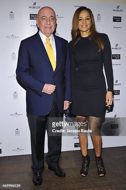 Adriano Galliani and his wife Helga Costa attend 'The Faces' Opening Exhibition on February 17, 2014 in Milan, Italy.