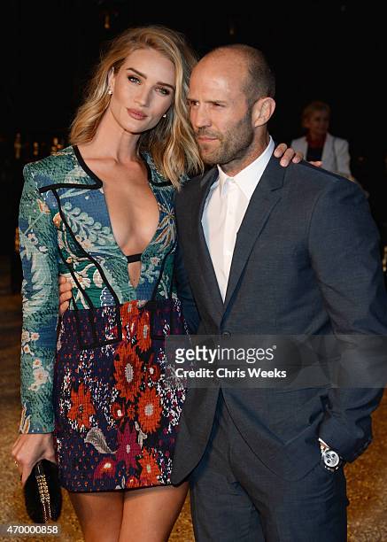Model Rosie Huntington-Whiteley and actor Jason Statham attend the Burberry "London in Los Angeles" event at Griffith Observatory on April 16, 2015...