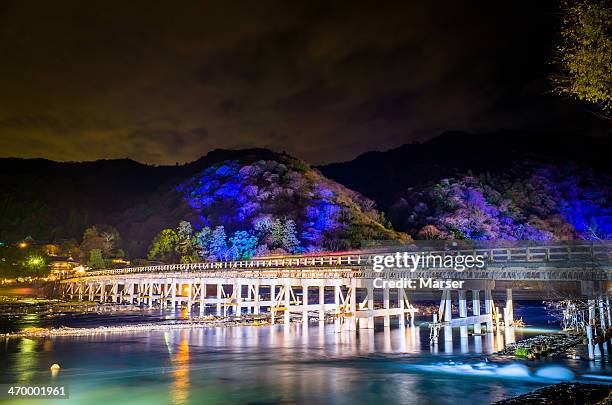 illuminated togetsu-kyou bridge - arashiyama ストックフォトと画像