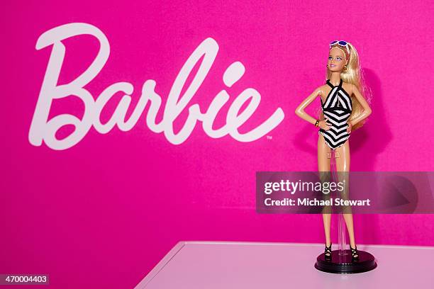 View a Barbie doll at the Sports Illustrated Swimsuit 50th Anniversary Pink Carpet celebration on February 17, 2014 in New York City.