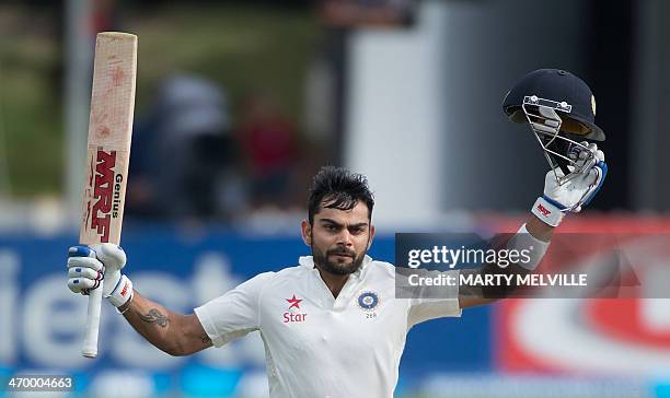 Virat Kohli of India celebrates 100 runs during day 5 of the 2nd International Test cricket match between New Zealand and India in Wellington at the...