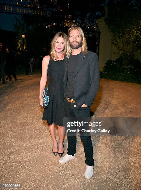 Alison Hawkins and musician Taylor Hawkins of Foo Fighters attend the Burberry "London in Los Angeles" event at Griffith Observatory on April 16,...