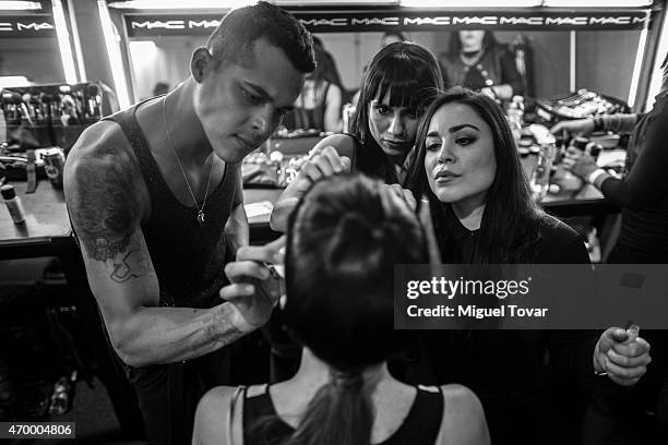 Makeup artists at the backstage of Mercedes-Benz Fashion Week Mexico Fall/Winter 2015 at Campo Marte on April 16, 2015 in Mexico City, Mexico.