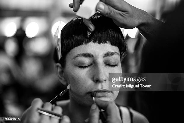 Model gets ready at the backstage of Mercedes-Benz Fashion Week Mexico Fall/Winter 2015 at Campo Marte on April 16, 2015 in Mexico City, Mexico.