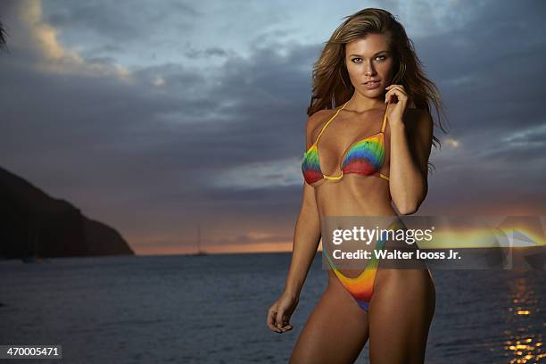 Swimsuit Issue 2014: Model Samantha Hoopes poses for the 2014 Sports Illustrated Swimsuit issue on December 4 on Saint Lucia. Body painting by Joanne...