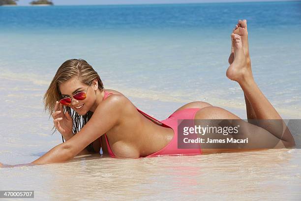Swimsuit Issue 2014: Model Kate Upton poses for the 2014 Sports Illustrated Swimsuit issue on November 02, 2013 in Aitutaki, Cook Islands. PUBLISHED...