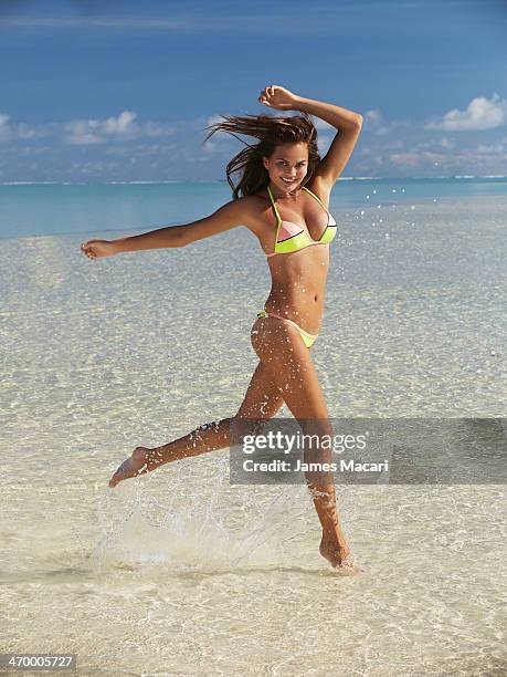 Swimsuit Issue 2014: Model Chrissy Teigen poses for the 2014 Sports Illustrated Swimsuit issue on November 5, 2013 in Avarua, Cook Islands, New...