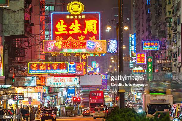 bright neon signs colourful crowded cityscape kowloon hong kong china - kowloonhalvön bildbanksfoton och bilder