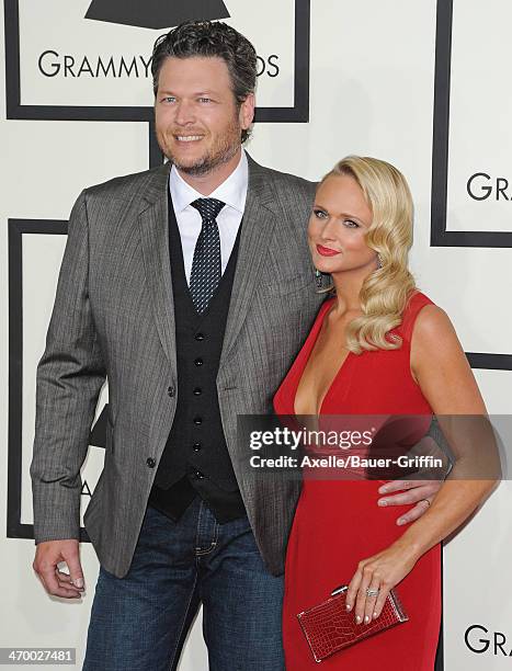 Singers Blake Shelton and wife Miranda Lambert arrive at the 56th GRAMMY Awards at Staples Center on January 26, 2014 in Los Angeles, California.