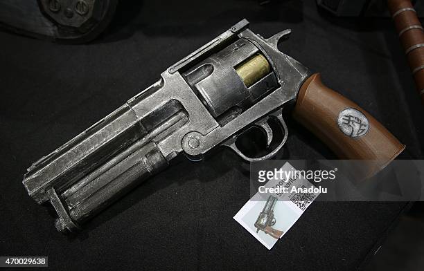 Printed gun figure is displayed during the 3D Prints Design Show at Javits Center, in New York, on April 16, 2015. The 3D Print Design Show, taking...
