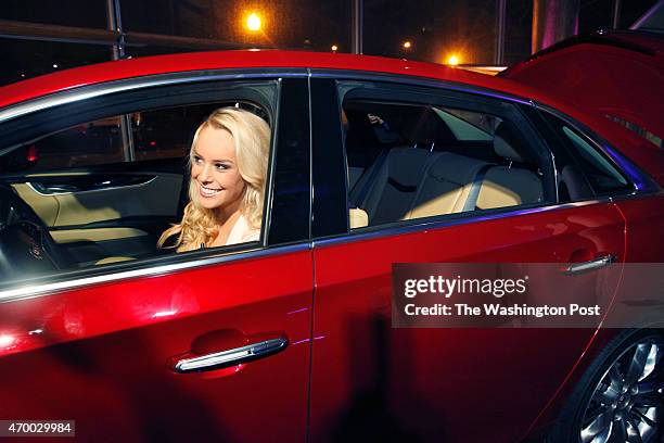 Britt McHenry, ABC7 weekend sports anchor, has fun in the candy apple Cadillac XTS 2013 ; there were also candy apple drinks and a candy bar, not to...