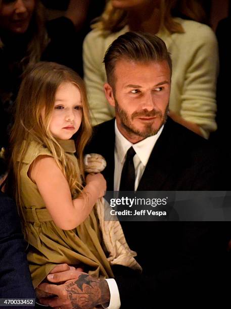 Harper Beckham and David Beckham attend the Burberry "London in Los Angeles" event at Griffith Observatory on April 16, 2015 in Los Angeles,...