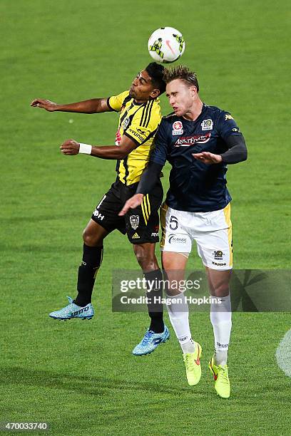 Roy Krishna of the Phoenix and Zachary Anderson of the Mariners compete for a header during the round 26 A-League match between the Wellington...
