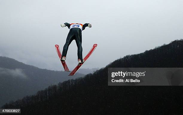 Mario Stecher of Austria makes a trial jump as he competes in the Nordic Combined Men's Individual LH during day 11 of the Sochi 2014 Winter Olympics...