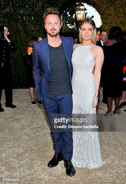 Actors Aaron Paul and Lauren Parsekian attend the Burberry "London in Los Angeles" event at Griffith Observatory on April 16, 2015 in Los Angeles,