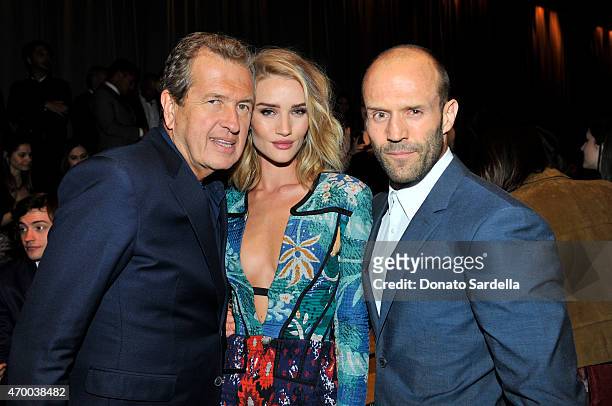 Photographer Mario Testino, model Rosie Huntington-Whiteley and actor Jason Statham attend the Burberry "London in Los Angeles" event at Griffith...