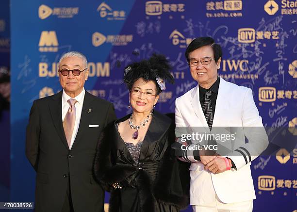Actor Kenneth Tsang, actress Petrina Feng Bo-Bo and actor Bak-Ming Wong arrive at the red carpet of the 5th Beijing International Film Festival at...