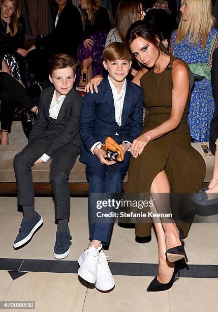 Cruz Beckham, Romeo Beckham and Victoria Beckham attend the Burberry "London in Los Angeles" event at Griffith Observatory on April 16, 2015 in Los...
