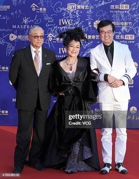 Actor Kenneth Tsang, actress Petrina Feng Bo-Bo and actor Bak-Ming Wong arrive at the red carpet of the 5th Beijing International Film Festival at...