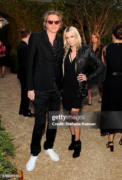 Musician John Taylor and Gela Nash attend the Burberry "London in Los Angeles" event at Griffith Observatory on April 16, 2015 in Los Angeles,...