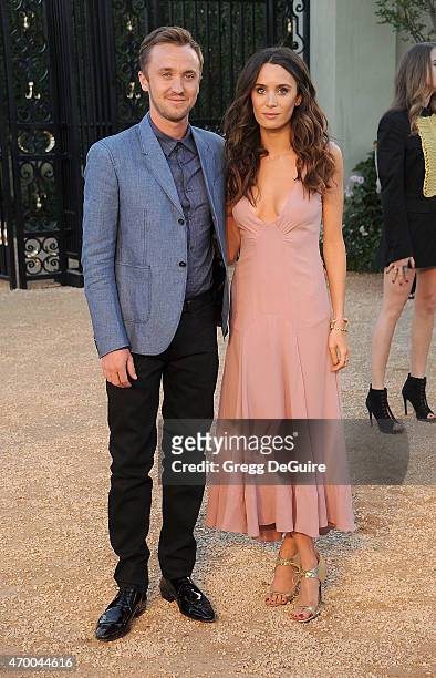 Actors Tom Felton and Jade Olivia attend the Burberry "London in Los Angeles" event at Griffith Observatory on April 16, 2015 in Los Angeles,...
