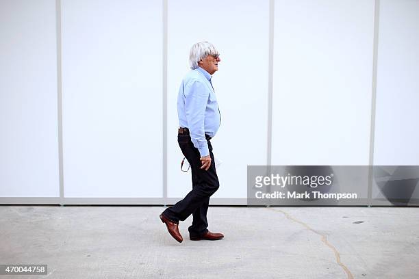 Supremo Bernie Ecclestone walks across the paddock during previews to the Bahrain Formula One Grand Prix at Bahrain International Circuit on April...