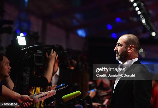 Former Footballer Eric Cantona of France speaks to the media at the 2015 Laureus World Sports Awards at Shanghai Grand Theatre on April 15, 2015 in...